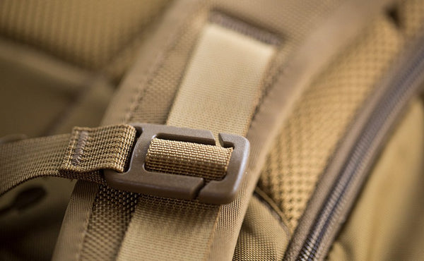 A close up of the Sternum Strap's attachment point